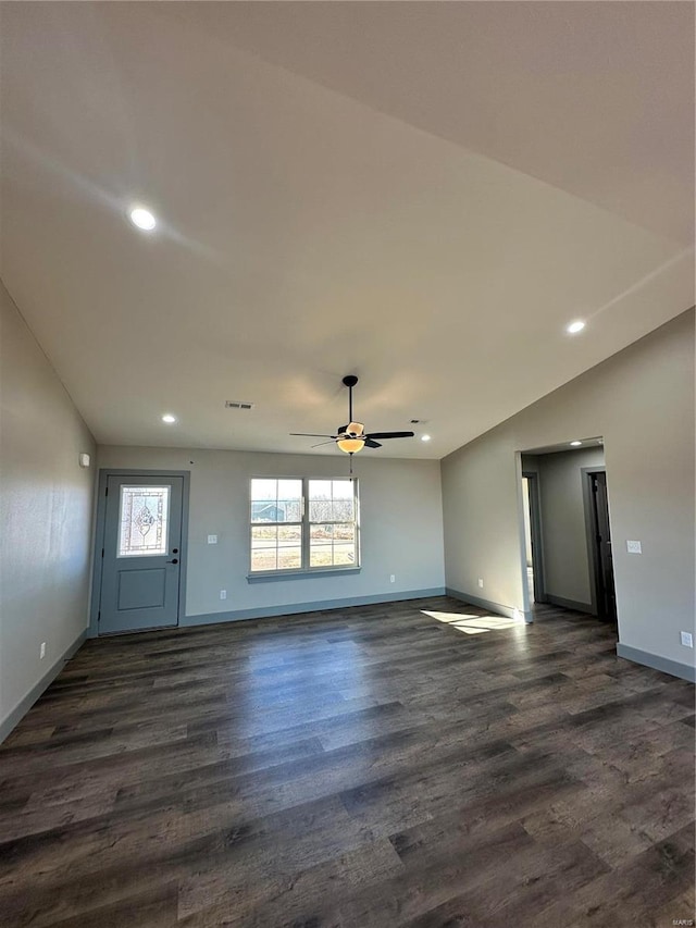 unfurnished living room with ceiling fan, recessed lighting, dark wood-type flooring, visible vents, and baseboards