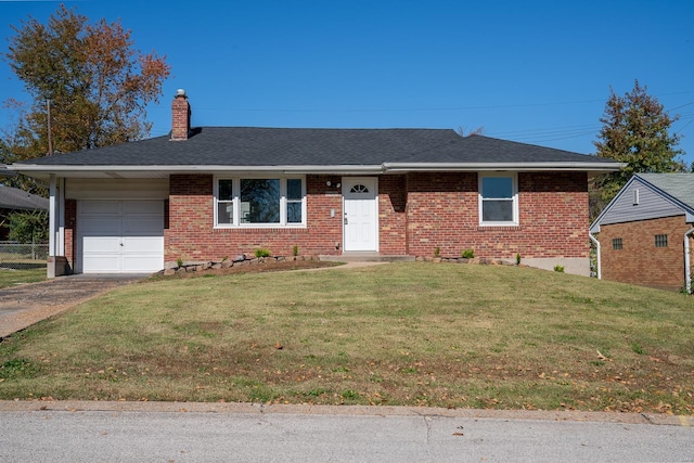 single story home featuring a front lawn and a garage