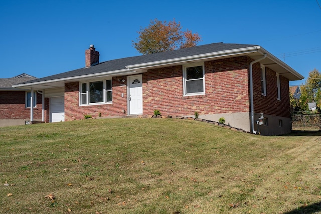 ranch-style house featuring a front lawn