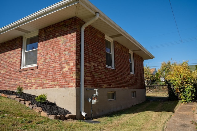 view of property exterior featuring a yard