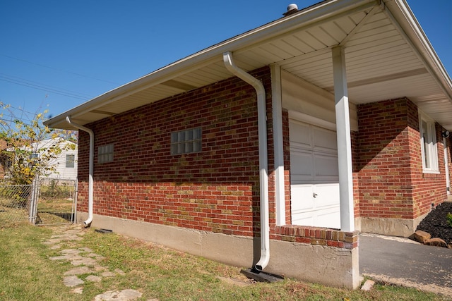 view of home's exterior with a garage