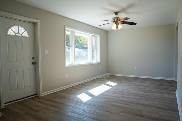 entrance foyer with dark hardwood / wood-style floors and ceiling fan