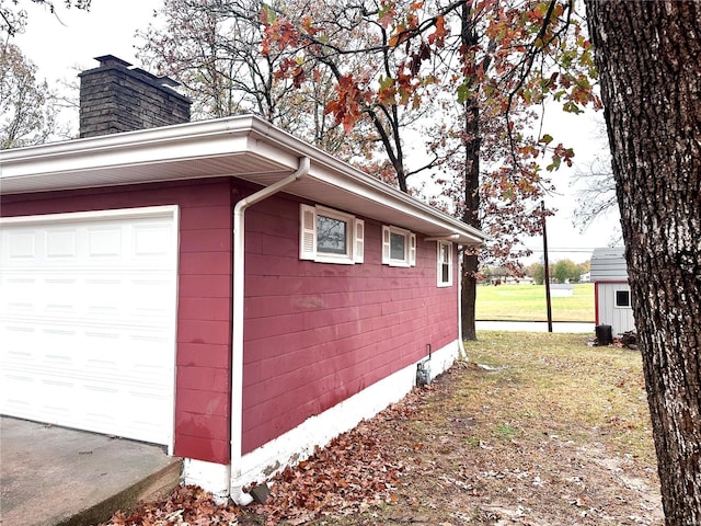 view of property exterior with a garage