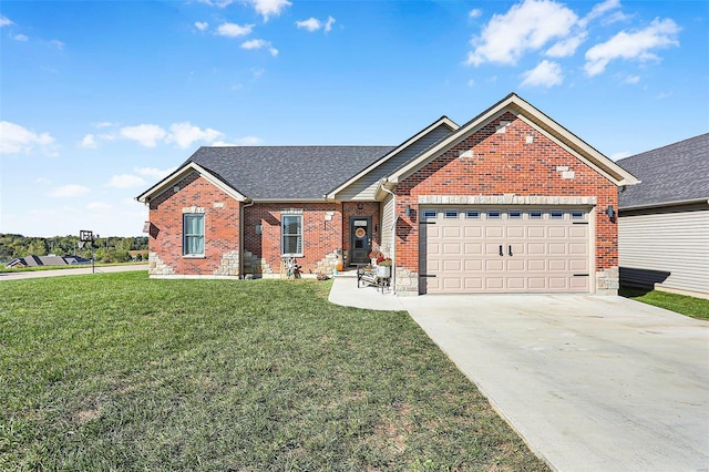 view of front facade with a front lawn and a garage