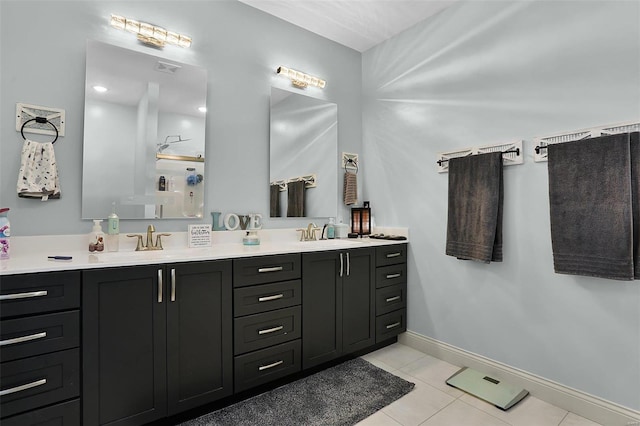 bathroom featuring vanity and tile patterned flooring