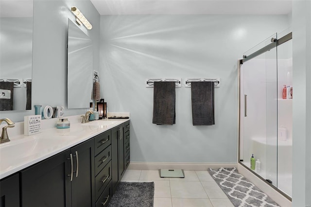 bathroom with vanity, tile patterned floors, and an enclosed shower