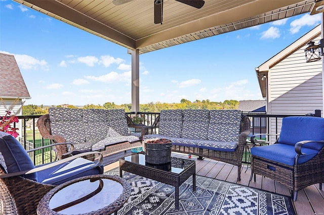 deck featuring ceiling fan and an outdoor hangout area