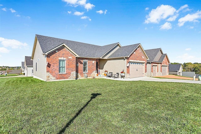 view of front of home featuring a front lawn and a garage