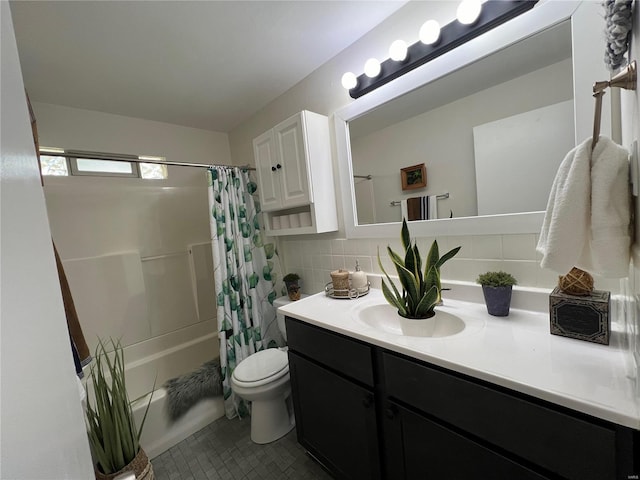 full bathroom with tile patterned flooring, toilet, decorative backsplash, shower / bath combo with shower curtain, and vanity