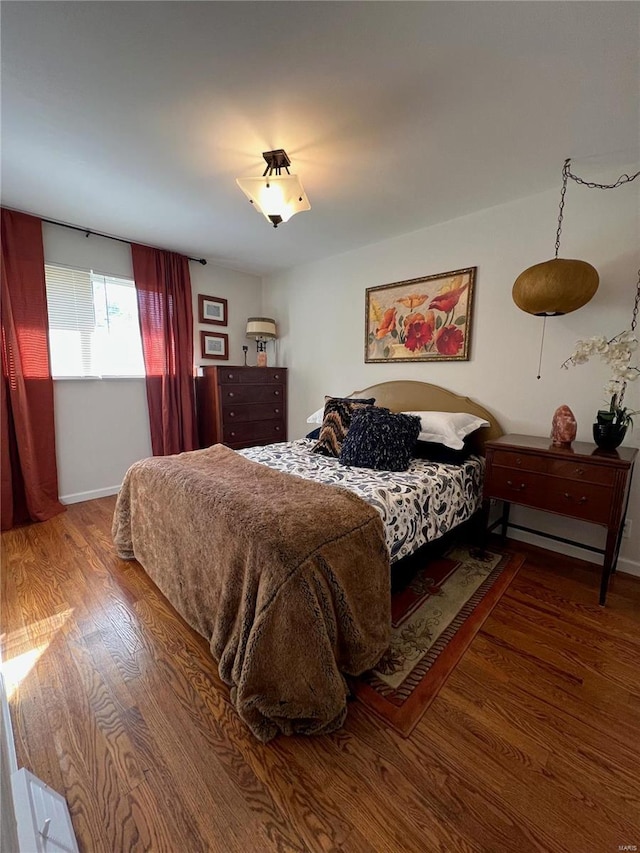 bedroom featuring hardwood / wood-style flooring