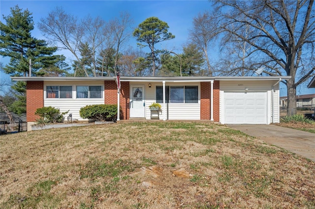 ranch-style home with brick siding, an attached garage, driveway, and a front yard