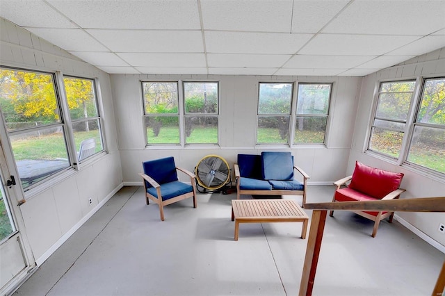 sunroom / solarium with a paneled ceiling