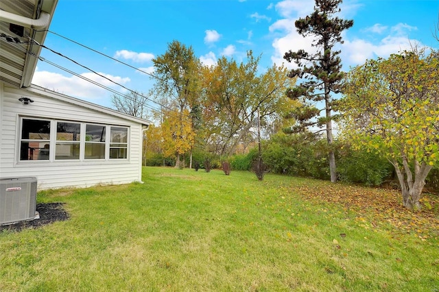 view of yard featuring central AC