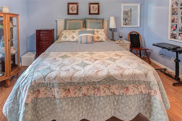 bedroom featuring light wood-type flooring