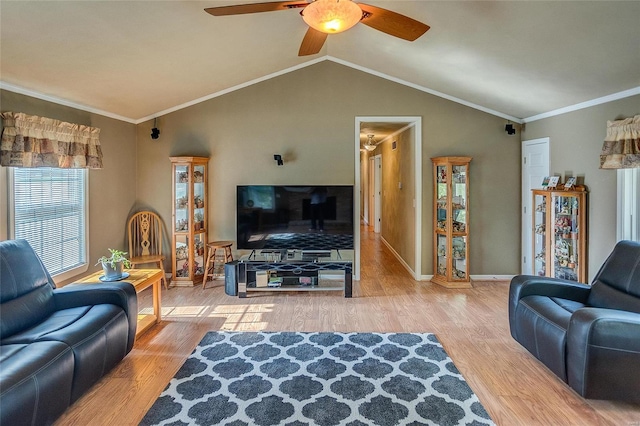 living room with crown molding, wood-type flooring, vaulted ceiling, and ceiling fan