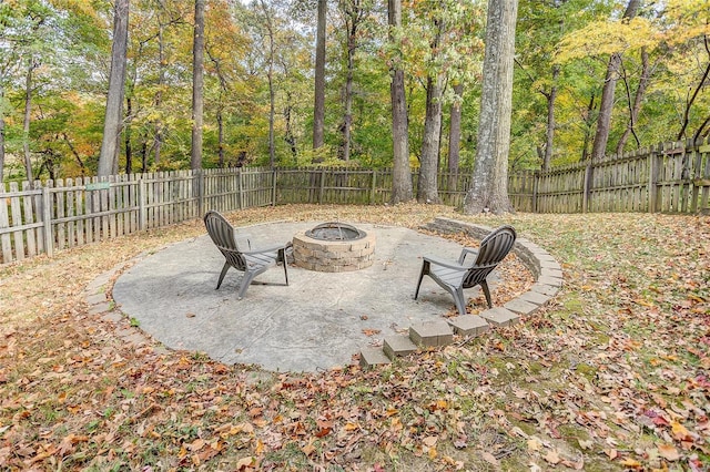 view of patio featuring a fire pit