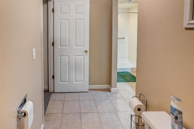 bathroom with tile patterned flooring