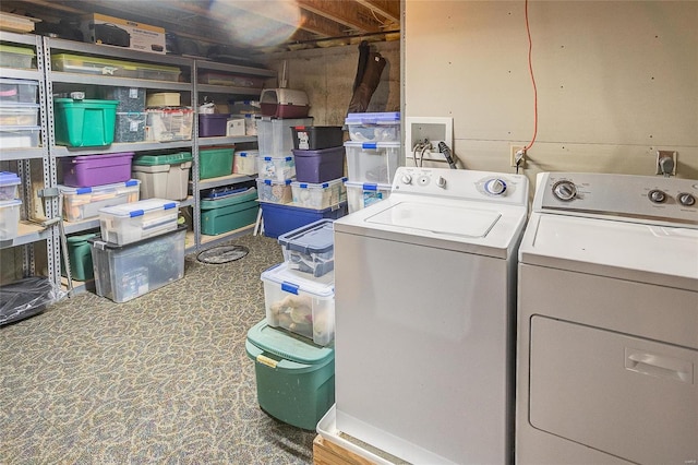 washroom with independent washer and dryer