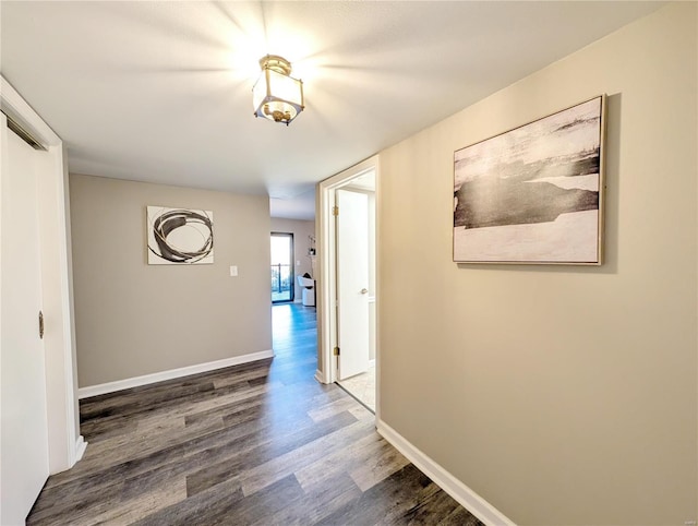 hallway with wood-type flooring