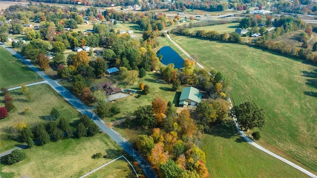 drone / aerial view with a water view and a rural view