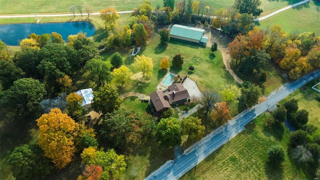 aerial view with a rural view and a water view