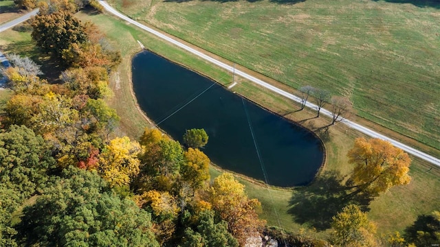 bird's eye view featuring a rural view and a water view