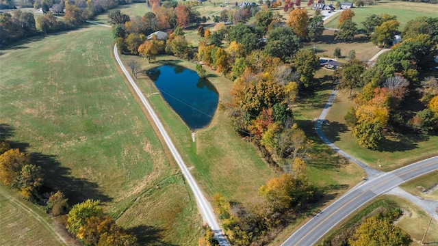 aerial view featuring a rural view and a water view