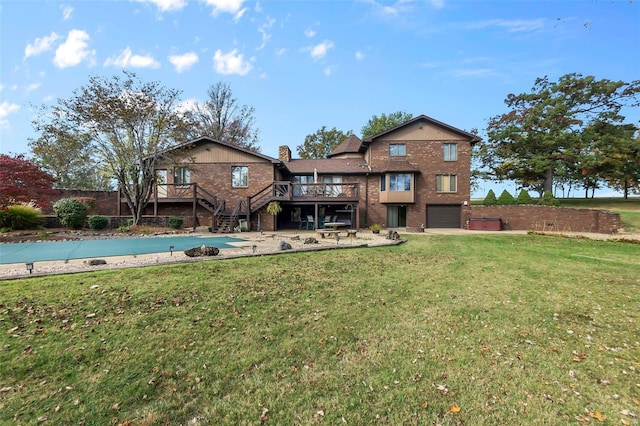 back of house with a wooden deck, stairway, a lawn, brick siding, and an attached garage