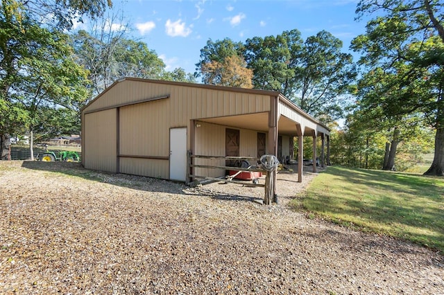 view of outdoor structure with a yard