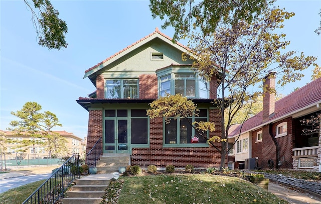 view of front of house with central air condition unit