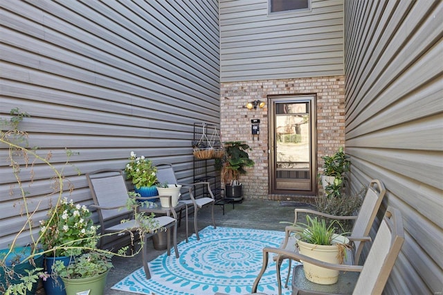 doorway to property featuring a patio