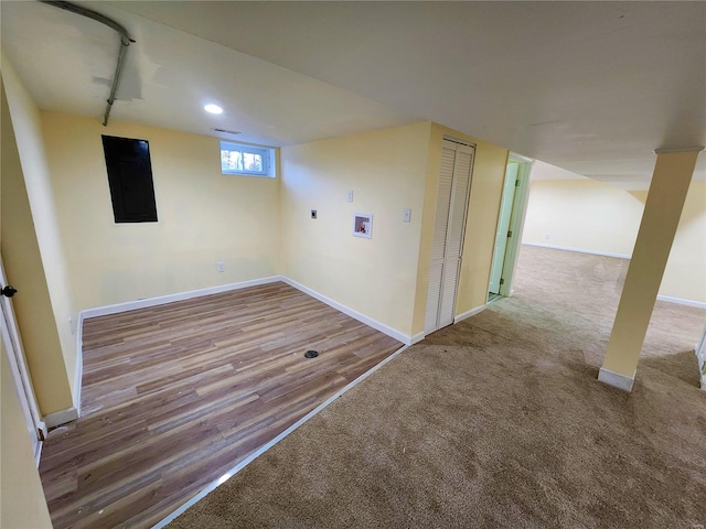 washroom featuring rail lighting, hookup for an electric dryer, electric panel, hookup for a washing machine, and carpet floors