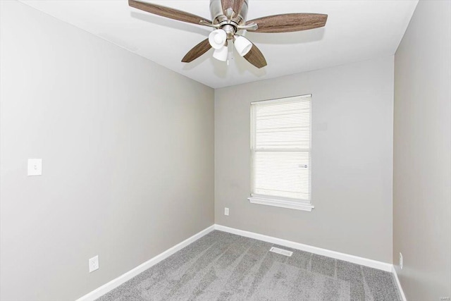 carpeted empty room with ceiling fan