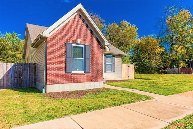 view of property exterior featuring a yard