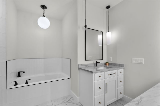 bathroom with vanity and a tub to relax in