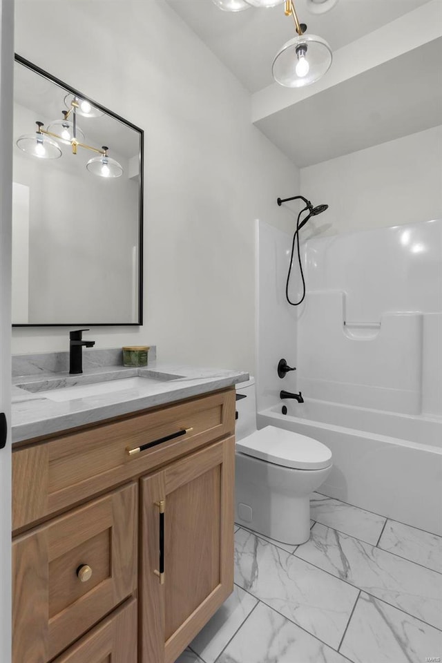 full bathroom featuring vanity, shower / washtub combination, and toilet