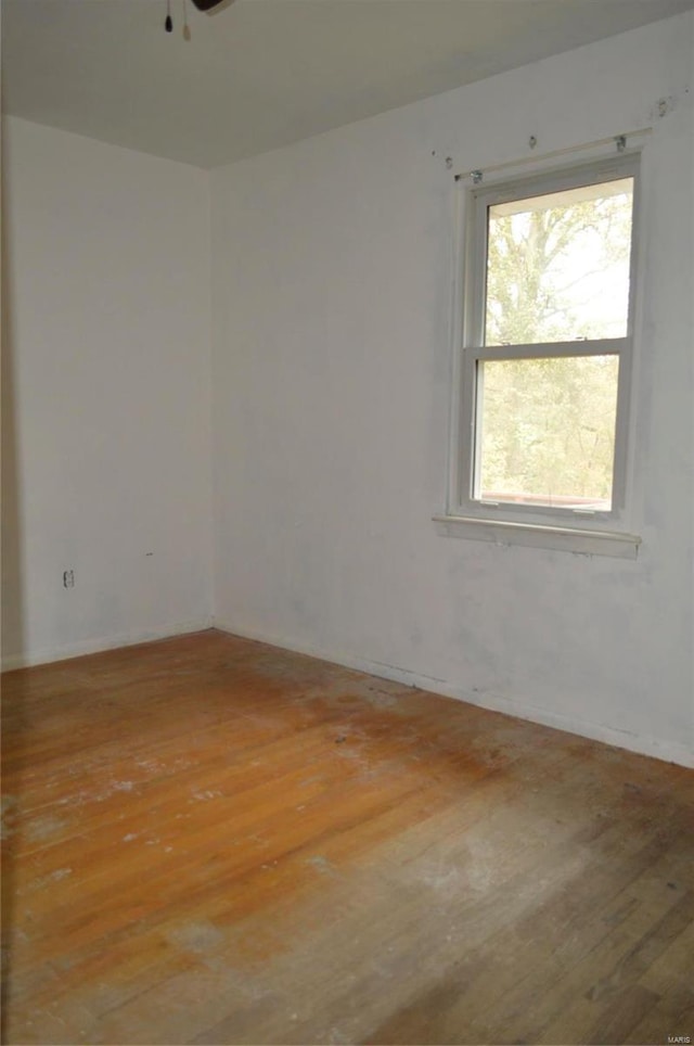 spare room with light wood-type flooring