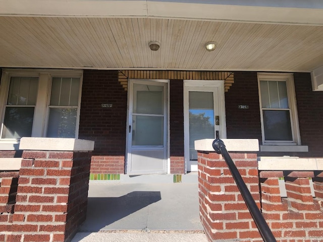 doorway to property featuring a porch