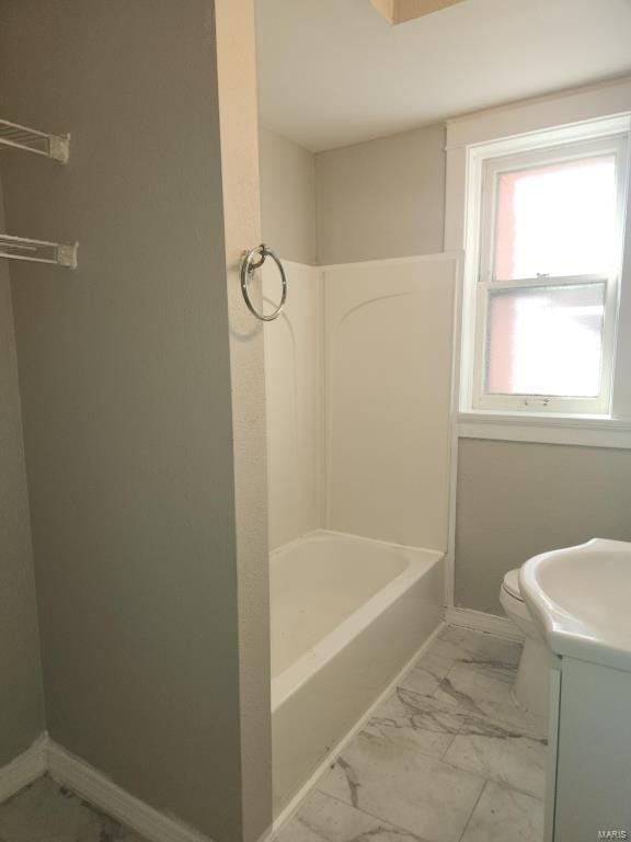 full bathroom featuring bathtub / shower combination, vanity, and toilet