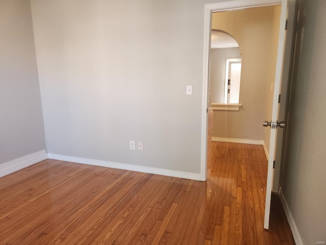 empty room featuring wood-type flooring