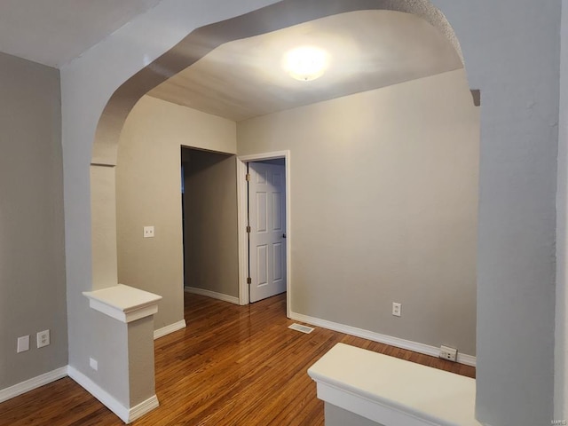 unfurnished room featuring hardwood / wood-style floors