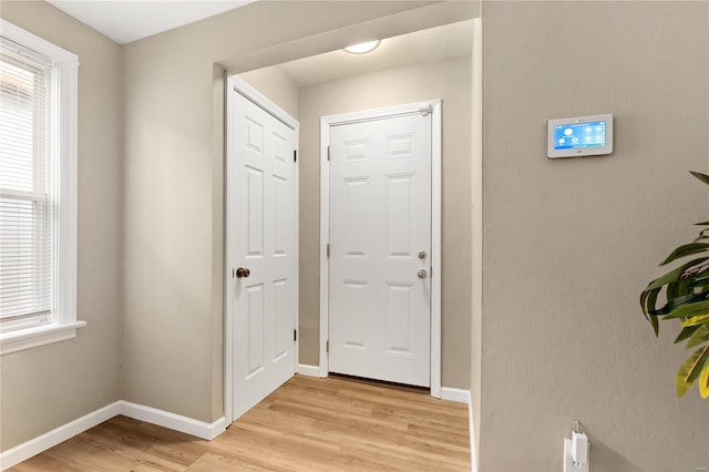 doorway to outside featuring light hardwood / wood-style flooring