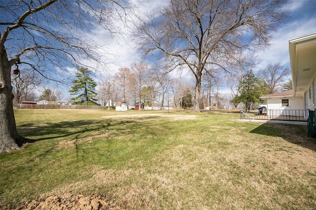 view of yard featuring fence