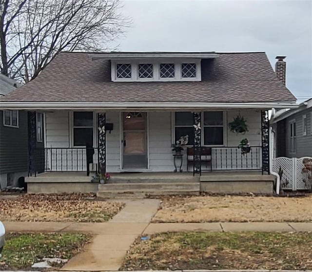 bungalow-style home with a porch