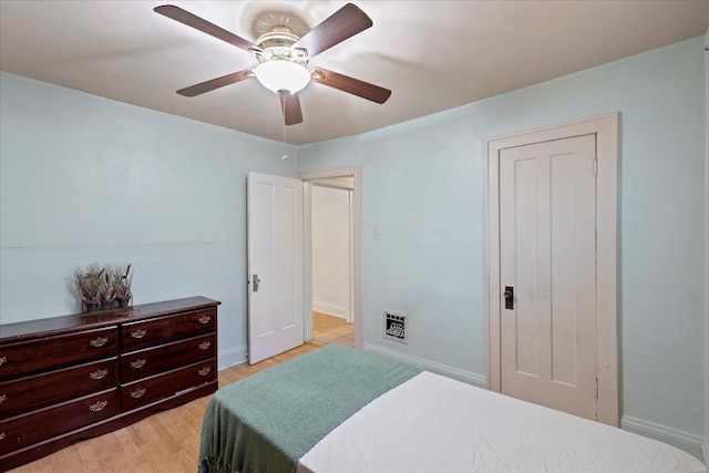 bedroom featuring ceiling fan and light hardwood / wood-style floors