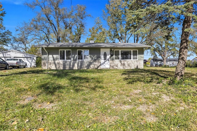 single story home with a front yard