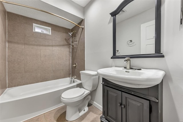 full bathroom featuring toilet, tile patterned floors, vanity, and tiled shower / bath combo