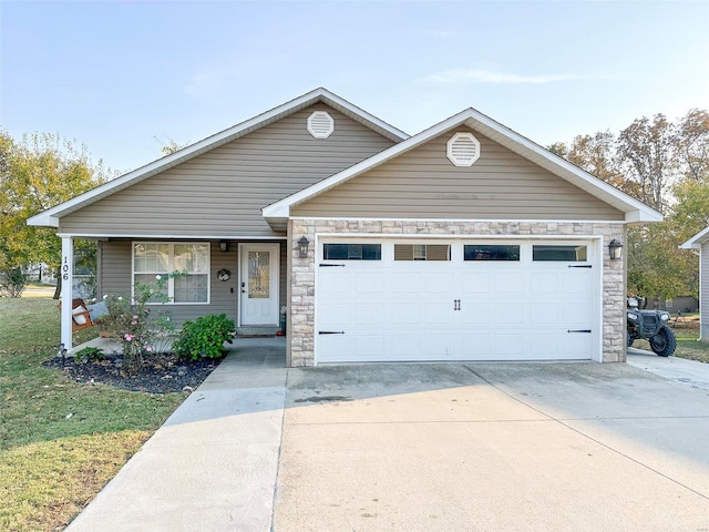 view of front of property with a garage