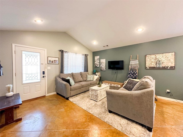 tiled living room with vaulted ceiling