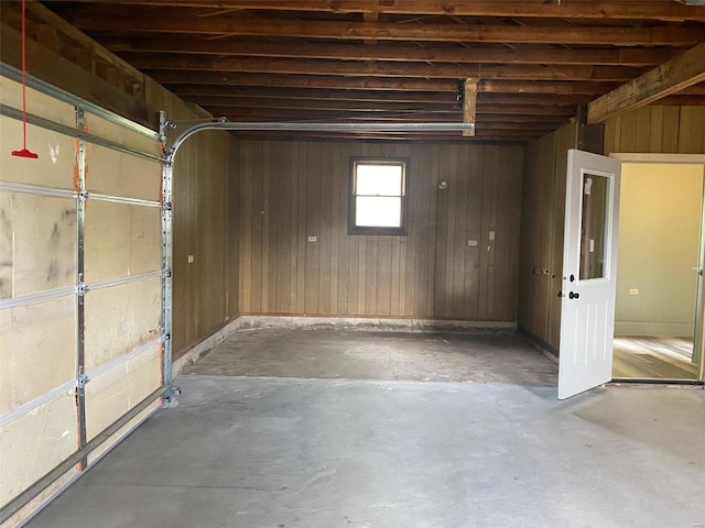 garage with wood walls